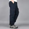 Macacão Novo de Primavera e Outono Masculino Solto Plus Size Reta Casual Calças de Trabalho com Vários Bolsos Marca da Moda Calças de Proteção para Homens