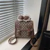 Mochila Estilo Universitario de Lunares y Moño, Nueva Colección Otoño 2026, Moda Versátil para Mujer, Mochila Diaria, Bolso de Mujer al por Mayor