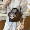 Bolso Pequeño Retro de Nuevo Estilo de Alta Gama Transfronterizo 2026 para Mujer, Bolso Cruzado Versátil para Hombro, Bolso Cubo de Moda