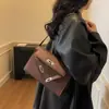 Bolso de mano cuadrado pequeño retro de nicho estilo coreano para mujer, nuevo de otoño 2026, moderno, con bloques de color, para hombro y axila
