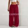 Pantalones casuales de pierna ancha, elásticos, de cintura con cordón, color liso, sueltos, con textura de corteza arrugada, estilo nuevo, europeo y americano, de Amazon, para mujer