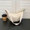 Bolso nuevo estilo japonés para dumplings, bolso de lona de un solo hombro, bolso cruzado para estudiante, bolso para teléfono deportivo, bolso casual simple, bolso de hombro pequeño