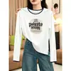 La camiseta de manga larga de algodón puro más vendida de este año para mujer, una prenda elegante y versátil perfecta para usar en capas en otoño, con un diseño único y moderno.