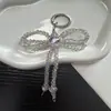 Cadena para teléfono con colgante de llavero de lazo en forma de corazón de alta gama y lujo, accesorio de bolso elegante y dulce