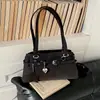 Coleção de outono 2026 transfronteiriça: bolsa tote requintada, de grande capacidade, estilo nicho para o trajeto diário, bolsa de ombro fashion