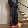 Pantalones de chándal resistentes estilo americano para hombre, pantalones de tres rayas para primavera y otoño, pantalones deportivos casuales rectos holgados versátiles para adolescentes y estudiantes