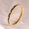 Pulsera de Trébol de Cuatro Hojas Pulsera de Acero Inoxidable para Mujer Pulsera de Acero de Titanio Color Dorado con Diamantes Estilo Blanco y Negro Joyería Que No Se Desvanece Transfronterizo