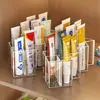 Caja de almacenamiento de medicamentos con compartimentos, un organizador en forma de tubo para medicamentos, un botiquín de primeros auxilios para el hogar y un estante en forma de tubo para almacenar cremas y ungüentos