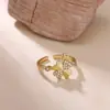 Anel de Flor Trevo de Quatro Folhas Cravejado com Zircônia Transfronteiriço, Luxo Leve, Banhado a Ouro, Personalizado, Anel Geométrico de Alta Qualidade para Mulheres, Comércio Exterior
