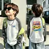 Camiseta base de forro polar alemán de doble cara para niño otoño e invierno estilo coreano prenda superior camiseta base capa interior cuello redondo bloques de color de dibujos animados manga larga