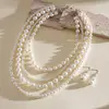 Collar de perlas en capas con cuentas transfronterizo europeo y americano, cadena para la clavícula estilo fiesta vintage, lujo ligero, accesorio versátil de alta gama para mujer