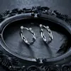 Pendientes de Acero de Titanio Retorcido Transfronterizos para Hombre, Pendientes de Alta Gama Modernos y Únicos para Mujer, Joyería Simple y Versátil al por Mayor