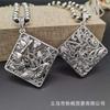 Collar de plata tibetano étnico retro de alta gama cadena larga para suéter otoño e invierno colgante hueco tridimensional giratorio venta al por mayor