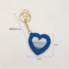 Espejo de Maquillaje Portátil con Forma de Corazón de Cuero Llavero Espejo Mini Colgante para Bolso Multicolor Venta al por Mayor de Fábrica en Stock