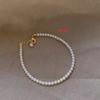 Nova Pulseira Elástica Simples de Pérola Estilo Francês Moda Elegante de Luxo Leve Pulseira Clássica Versátil Pulseira Nicho Distintiva