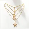 Cadena de Perlas Oceánicas de Venta Caliente Transfronteriza Europea y Americana Cadena para Clavícula de Mujer Colgante de Estrella de Mar y Concha Collar Multicapa Apilable Venta al por Mayor