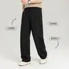 Pantalones casuales grises de pierna ancha para hombre, nuevo estilo de verano 2026, pantalones de traje fluidos, pantalones rectos holgados y estilizados