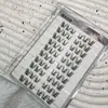 Cola para Cílios Yingmeijia Sem Cola Dez Fileiras de Pedaços Pequenos Finos Cílios Sino de Vento Pequeno Segmentados em Aglomerados Únicos Espessos no Canto Externo Essencial para Maquiadores