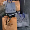 Bolsa de Vino de Tela No Tejida Publicidad Textiles para el Hogar Paquete de Regalo de Cuatro Piezas Ropa para Mujer Ropa para Niños Bolsa de Compras