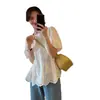 Nuevo estilo francés de verano, blusa tipo muñeca bordada para mujer, top blanco hueco de manga corta con burbujas, sentido del diseño, nicho