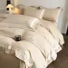 El fabricante suministra juego de cuatro piezas de bordado de aplique de algodón de fibra larga para ropa de cama de lujo ligero de alta gama para uso doméstico, incluyendo fundas de edredón y sábanas, al por mayor