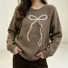 Nuevo jersey transfronterizo estilo europeo y americano 2026, sudadera simple y casual con lazo, cuello redondo, corte holgado, suéter de manga larga para mujer, adecuado para otoño e invierno