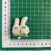 Nueva Versión Coreana Dulce Dibujo Animado Conejo Tela Original Lazo Conejo Broche para el Cabello Bolsa Rellena de Algodón Accesorio Colgante