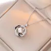 Colar Feminino Moda Nicho Novo Design Pingente Celebridade da Internet Flor de Zircônia Bauhinia Rotativa Temperamento Colar de Aço Titânio