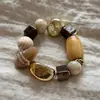 Pulseira de Contas Espiralada Estilo Vintage 2026 Novo Design de Nicho Acessório de Joia de Pérola para o Dia a Dia de Alto Padrão