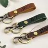 Cordão Chaveiro de Couro Transfronteiriço Chaveiro Laserável Pingente de Bolsa Chaveiro de Couro de Nicho para Homens e Mulheres