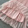 Conjunto de duas peças rosa suave estilo francês para mulheres, top justo de outono e saia plissada de cintura alta, conjunto elegante e moderno
