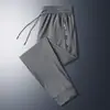 Pantalones de seda de hielo nuevos de verano 2025 para hombre, finos, de secado rápido, con pierna especial, sueltos y rectos, para hombre.