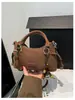 Bolsa de Balde Portátil Tendência Estilo Coreano Feminina 2026 Nova Simples Moda Nicho Toque de Luxo Ombro Único Transversal