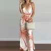 Roupas femininas mais vendidas no exterior: Loja independente do AliExpress, macacão de malha com estampa digital, pernas largas, gola halter, detalhe de amarração e fenda
