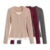 Elegante diseño de dos piezas, anti-rayas, suéter de punto de manga larga con botones, nueva colección de otoño, versátil y de corte ajustado, capa base elegante para mujer