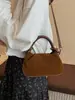 Colección de otoño 2026 transfronteriza: bolso de hombro elegante con pliegues, un bolso cruzado versátil y casual perfecto para ir al trabajo, y un bolso de mano sencillo