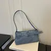 Moda Commute Estilo Coreano Cor Sólida Feminina 2026 Fivela Moda Casual Grande Capacidade Exquisita Baguete Ombro Único Bolsa de Ombro