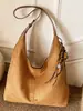 Bolsa de mano casual y minimalista de estilo coreano para mujer, perfecta para ir al trabajo, con un diseño retro, alto atractivo estético y una correa de hombro a la moda - la nueva colección otoño 2026