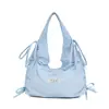 Bolsos de nicho coreanos, bolso tote grande para mujer, bolso de hombro informal de moda para el trabajo, bolso tipo cubo simple y versátil