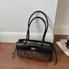 Bolsos transfronterizos 2026 nuevo moda vintage nicho casual bolso de hombro alta estética simple bolso de axila
