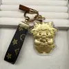 Llavero de cordero de oro puro 999, lindo símbolo de dinero de dibujos animados, colgante de bolsa de oro, amuleto de la suerte del año zodiacal, regalo