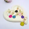 Comercio Electrónico Transfronterizo Aleación Colorido Cara Sonriente Esmaltada Llavero Chapado en Oro Expresión Asimétrica Accesorios Colgantes para Bolsos