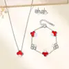 Conjunto de Collar de Trébol de Cuatro Hojas de la Suerte Incrustado con Diamantes Transfronterizo, Conjunto de Joyería de Acero de Titanio que Conserva el Color, No se Desvanece, Modelo Clásico Más Vendido