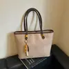 Bolso de mano retro transfronterizo, nuevo estilo para mujer 2026, bolso de hombro versátil, gran capacidad, adecuado para el trabajo y los desplazamientos