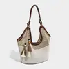 Bolsa de Compras Tejida de Gran Capacidad Nueva de Verano 2026, Bolso de Playa de Paja con Diseño de Nicho, Bolso Simple de Hombro Cruzado para Mujer