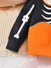 Ropa de dormir de dos piezas para niños, estilo europeo y americano, para primavera y otoño, con estampado de calaveras para Halloween, manga larga y pantalón largo, ropa para niños Ins