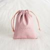 Bolsa de cuero sintético para guardar joyas, bolsa de almacenamiento con cordón, bolsa de franela para auriculares de paja, suministro directo de fábrica