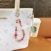 Corrente para Celular com Chaveiro de Flor de Cristal com Contas de Formato Especial Tendência da Moda Pingente para Bolsa Acessórios para Celular Venda por Atacado