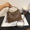 2026 Nuevo Estilo Bolso con Patrón de Lichi Lonchera Bolsa Cuadrada Pequeña Estilo Coreano de Nicho Bolsa de Maquillaje Color Sólido Bolso de Hombro Único Cruzado para Mujer