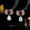 Pendientes colgantes de lazo de alta calidad con circonita microincrustada, aguja de plata S925, lujo atmosférico, pendientes de moda versátiles europeos y americanos